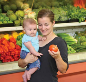 Woman shopping with infant
